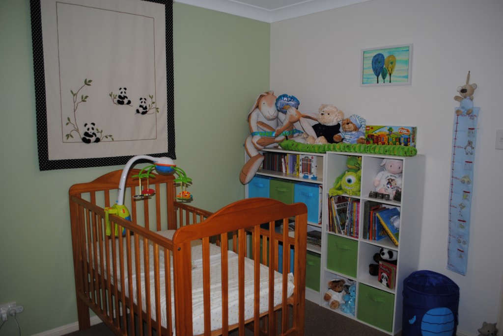 Tree painting on baby's nursery wall